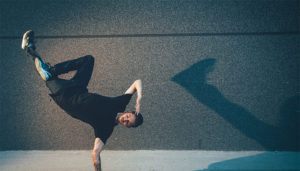 BBoy doing handstand on street